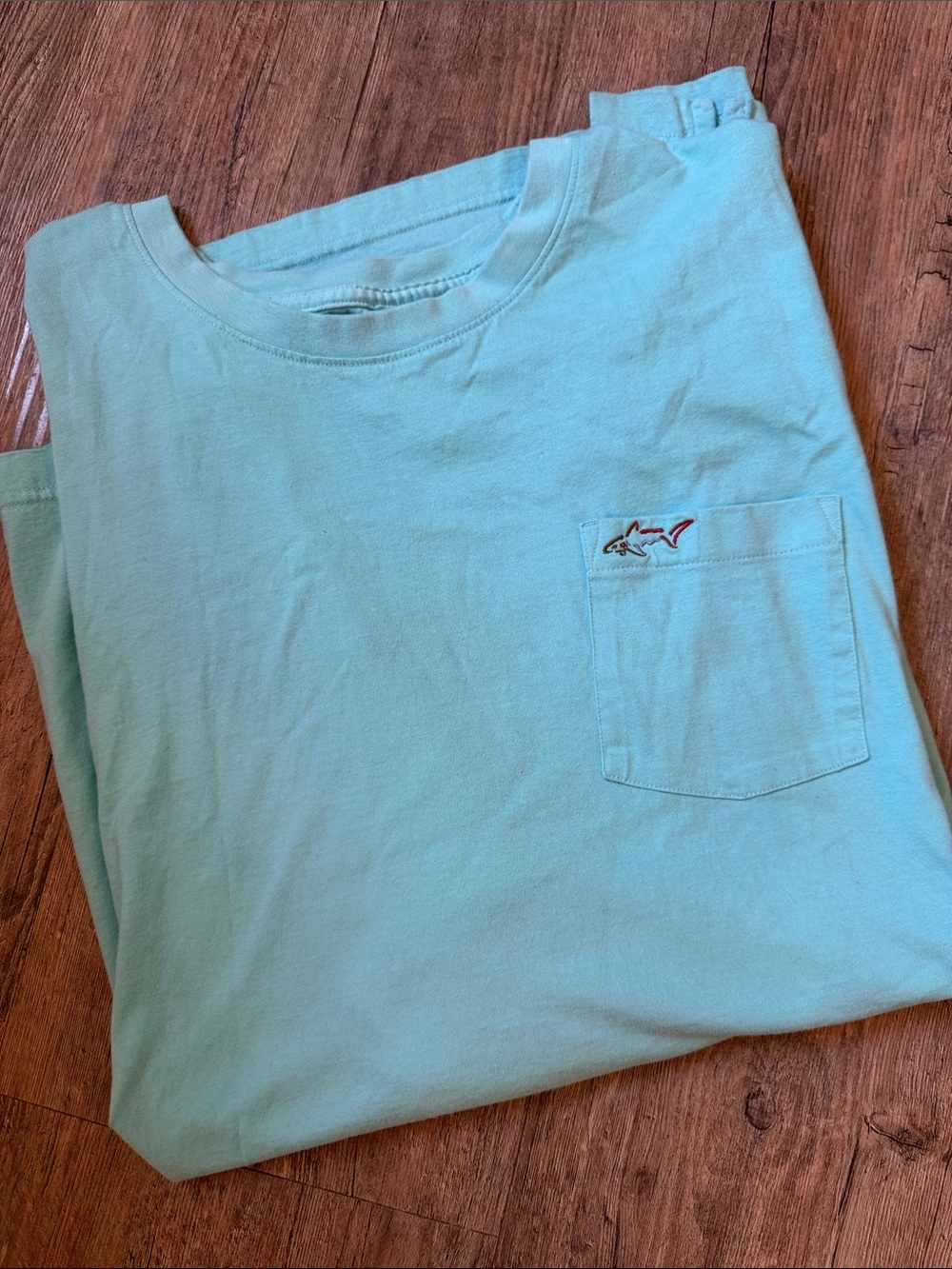 Greg Norman Collection Aqua Pocket Tee with Embroidered Fish